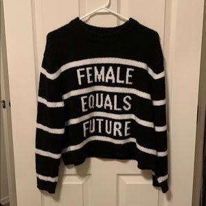 Striped sweater with phrase ‘female equals future’